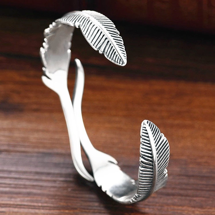 Lucky silver feather bracelet